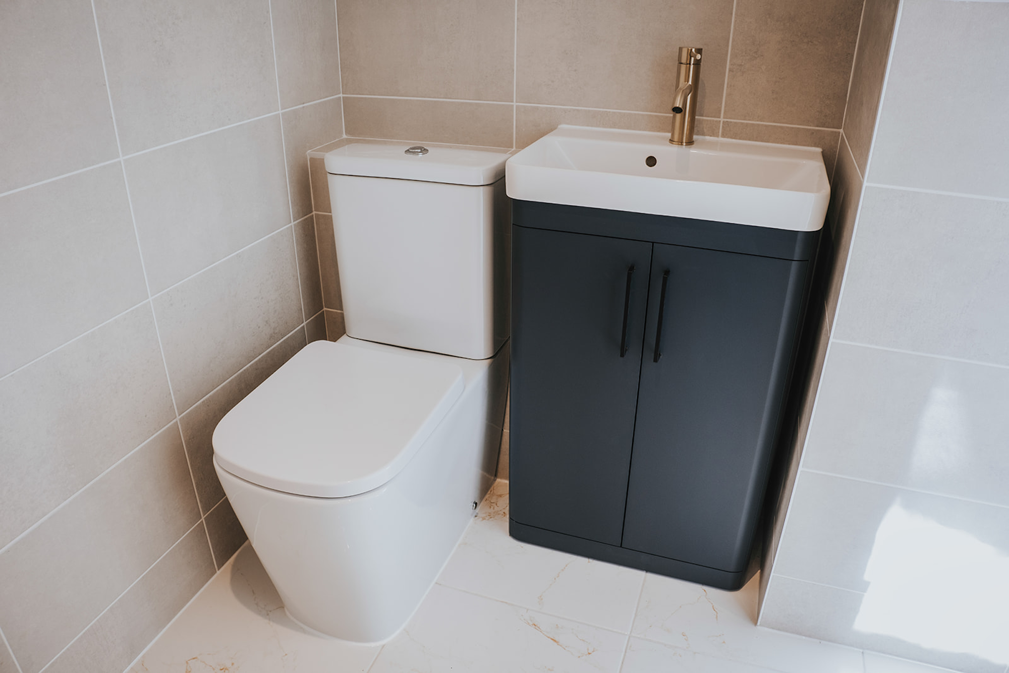 Saneux Hyde space saving basin and unit and Matteo close coupled toilet in Bignold House