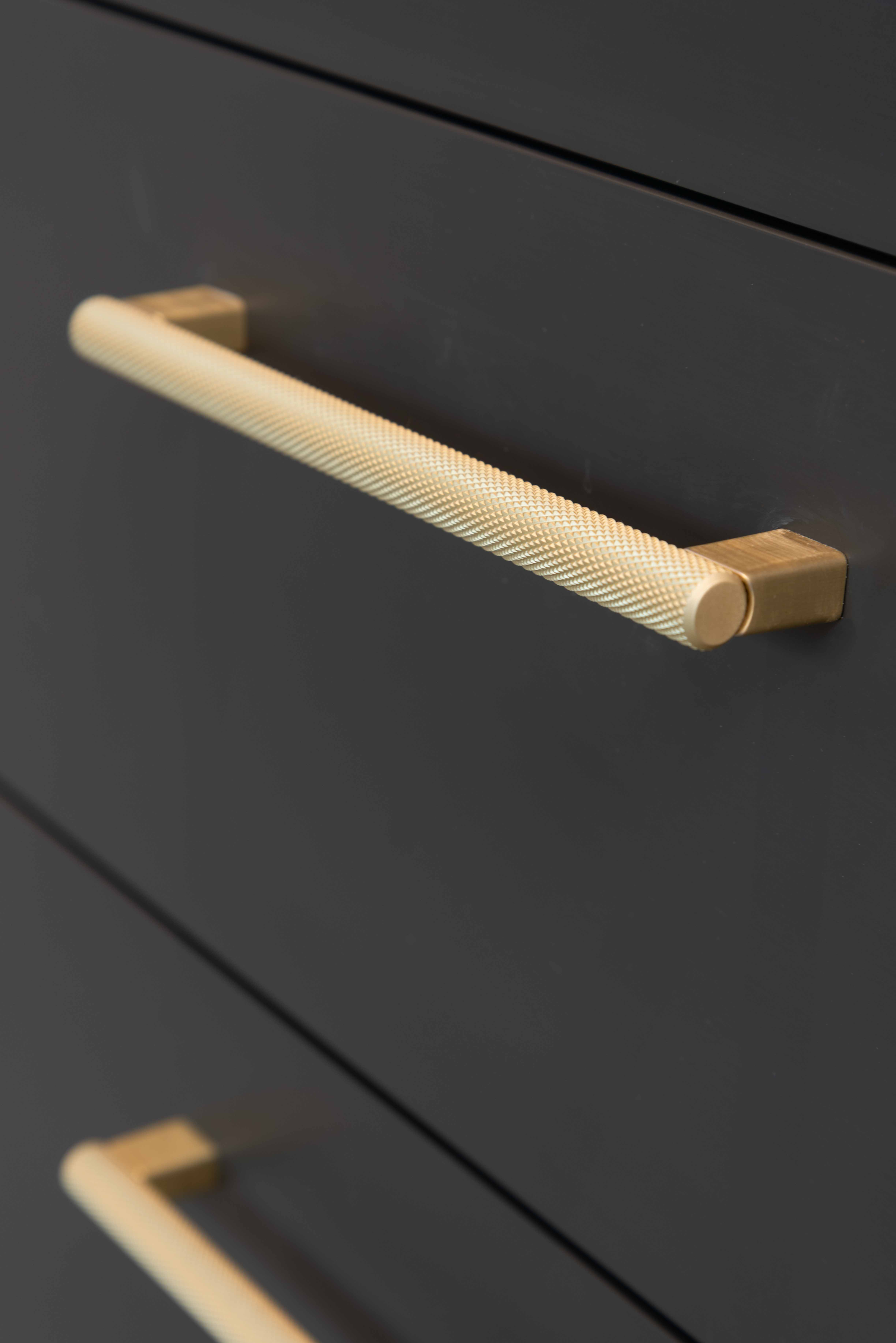 Saneux handles brushed brass knurled at Rubric Apartments, Whetstone
